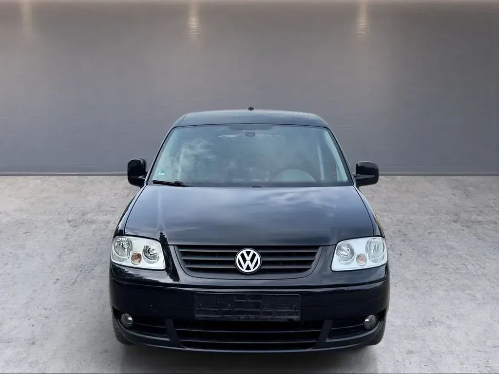 Gebraucht VW Caddy Team 105 PS (77 kW) 2010 Schwarz Van / Kleinbus