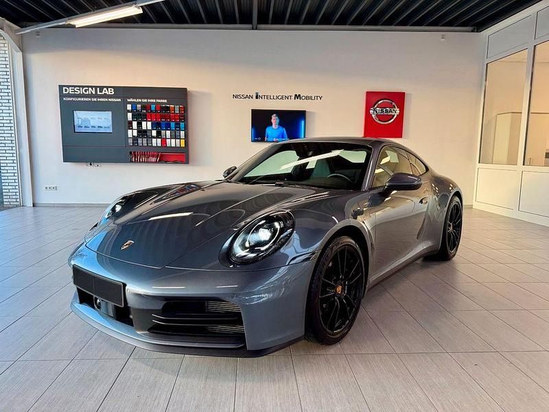 Gebraucht Porsche 911 Carrera 394 PS (289 kW) 2024 Vanadiumgrau metallic Coupé
