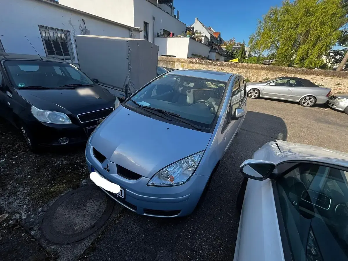 Second-hand Mitsubishi Colt 75 CP (55 kW) 2007 Albastru Hatchback