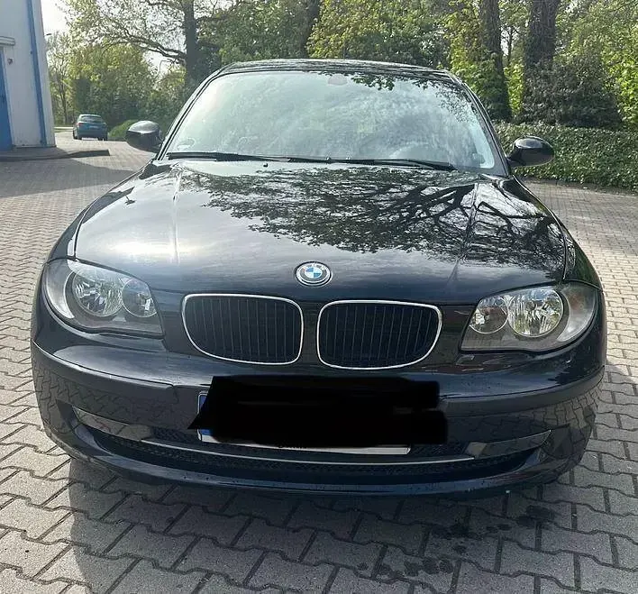 Second-hand BMW 116 122 CP (89 kW) 2009 Negru Hatchback