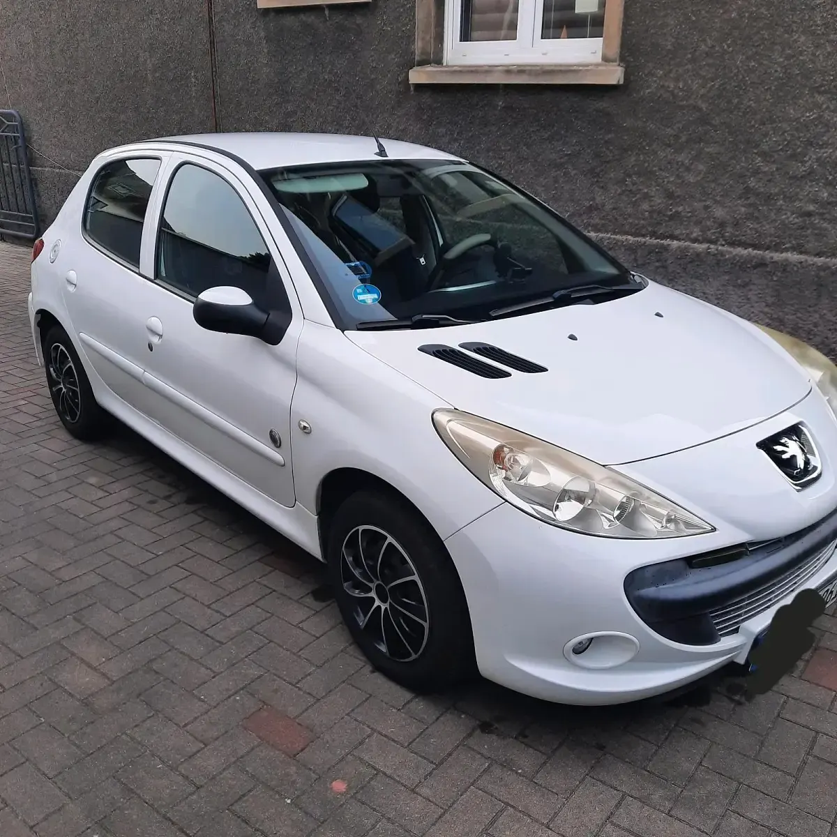 Gebraucht Peugeot 206+ 73 PS (53 kW) 2012 Weiß Kleinwagen