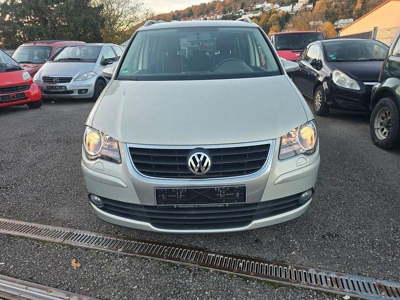 Gold Gebraucht 2009 VW Touran Conceptline Van / Kleinbus | 1.599 € - Bild 1/4