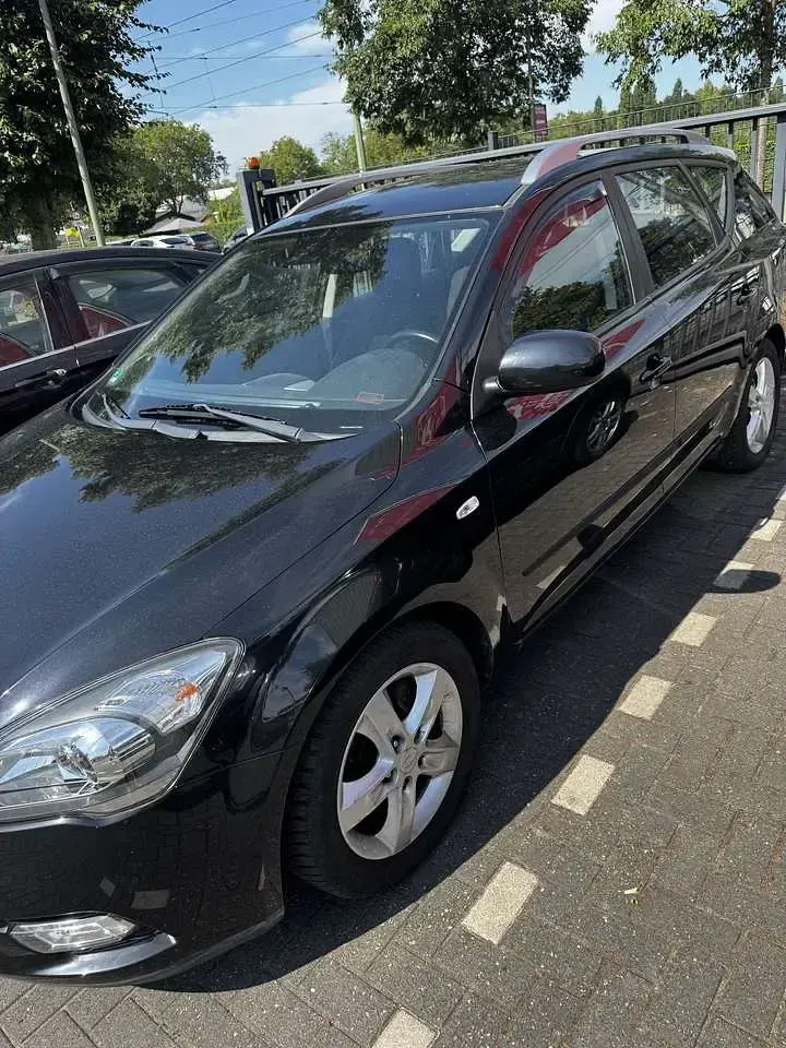 Gebraucht Kia Ceed Sportswagon Edition 7 125 PS (91 kW) 2011 Schwarz Kombi