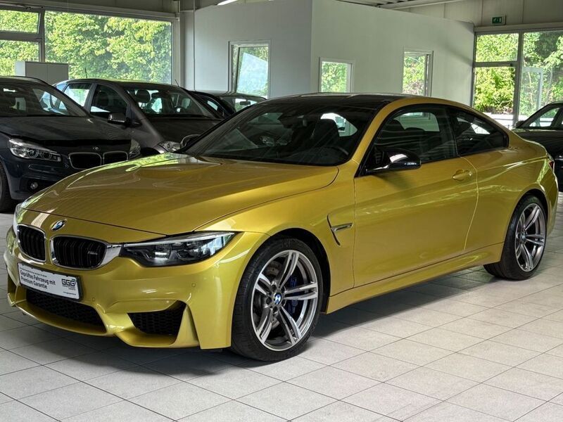 Gelb Gebraucht 2019 BMW M4 Performance Coupé | 55.900 € (Superpreis) - Bild 1/4