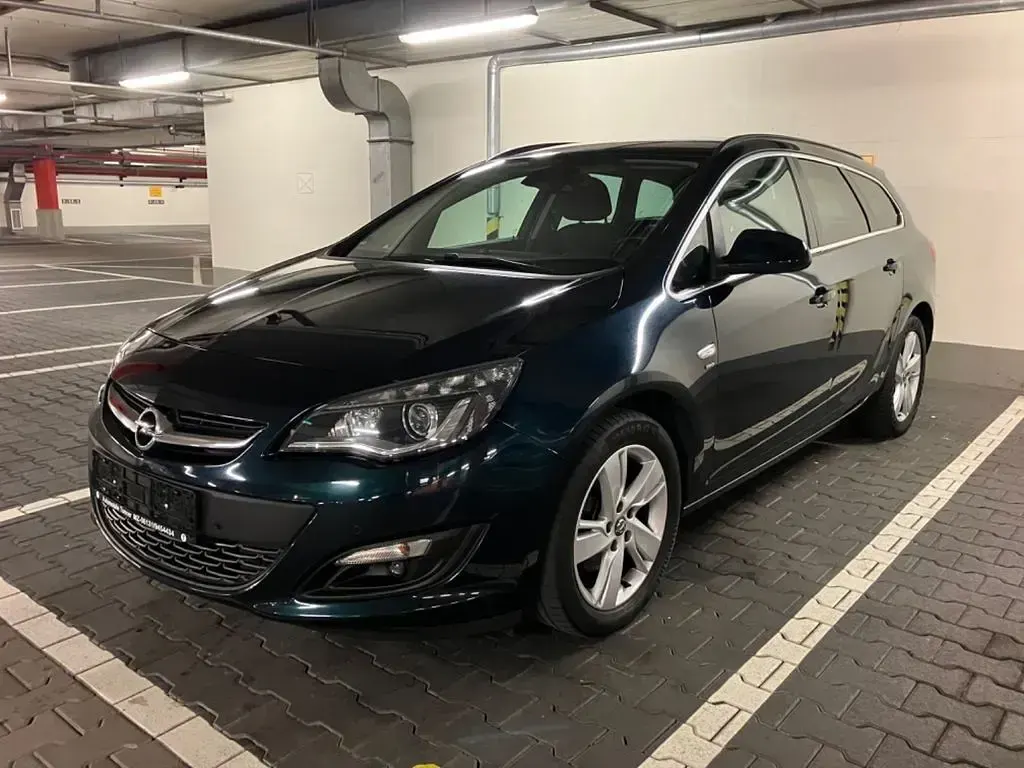 Gebraucht Opel Astra Edition 165 PS (121 kW) 2015 Grün Kombi