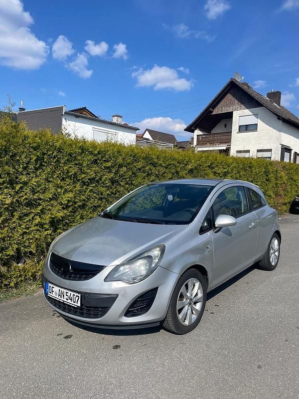 Second-hand Opel Corsa Active 87 CP (63 kW) 2013 Argintiu Hatchback