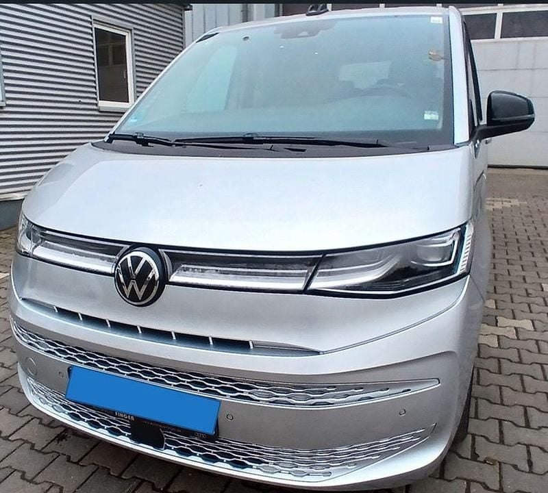 Grau Gebraucht 2023 VW Multivan Style Van | 42.840 € (Superpreis) - Bild 1/4