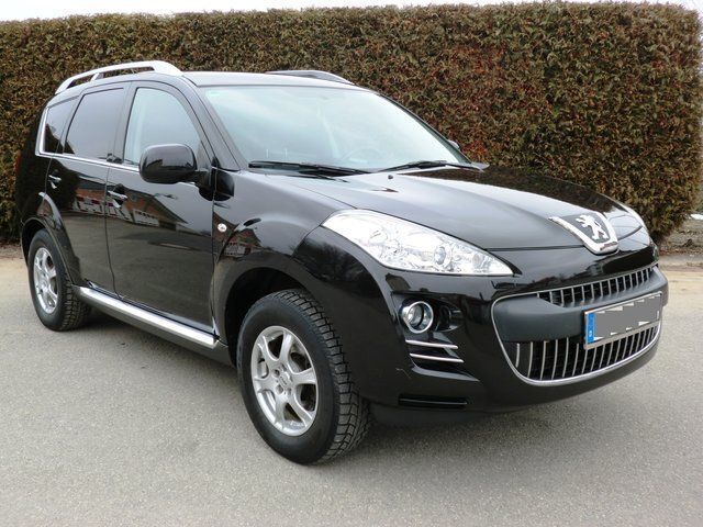 Schwarz metallic Gebraucht 2009 Peugeot 4007 Platinum SUV | 14.500 € - Bild 1/4