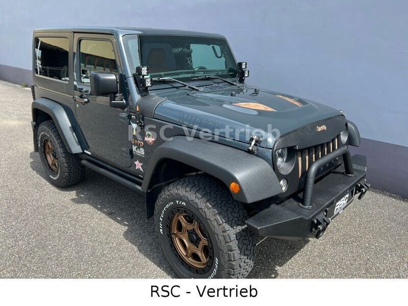 Grau Gebraucht 2016 Jeep Wrangler Unlimited Sport SUV | 33.000 € (Fairer Preis) - Bild 1/4