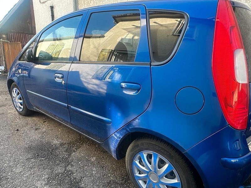Second-hand Mitsubishi Colt Motion 95 CP (69 kW) 2006 Albastru Hatchback