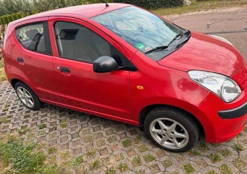 Gebraucht Nissan Pixo 68 PS (50 kW) 2011 Rot Kleinwagen
