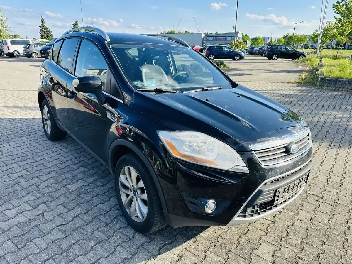 Gebraucht Ford Kuga Titanium 163 PS (119 kW) 2011 Pantherschwarz metallic SUV