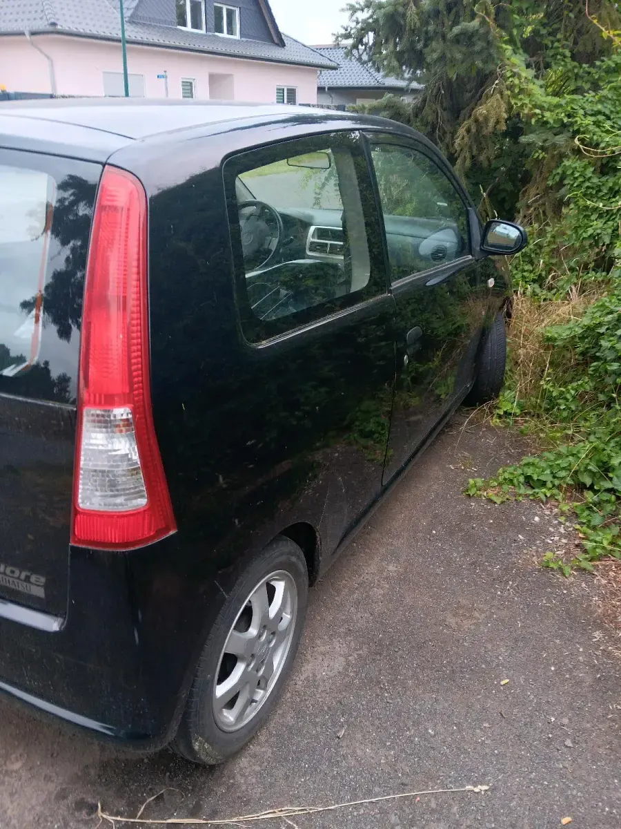 Gebraucht Daihatsu Cuore 58 PS (42 kW) 2006 Schwarz Kleinwagen