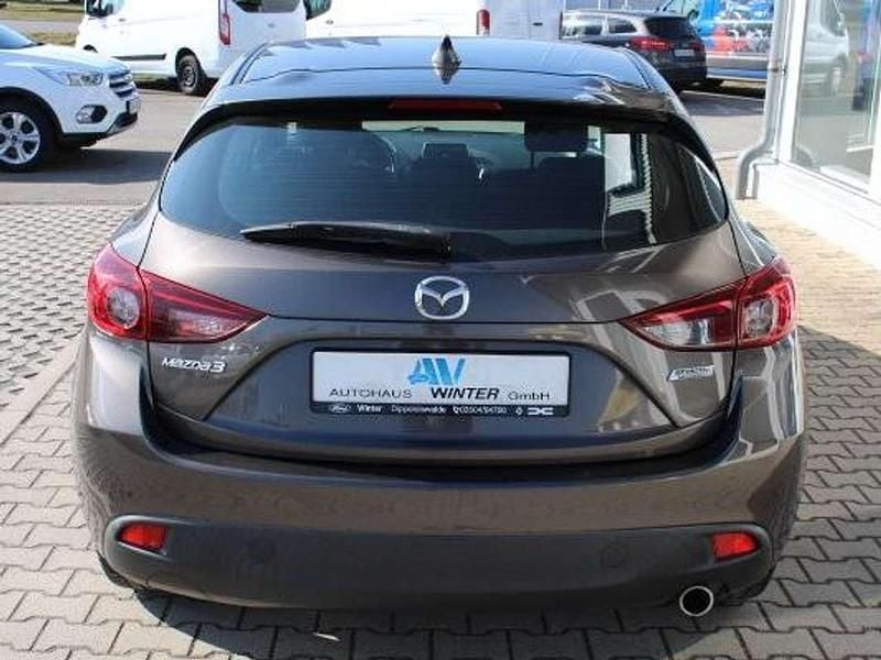 Gebraucht Mazda 3 Prime-Line 101 PS (74 kW) 2016 Obsidiangrau Limousine