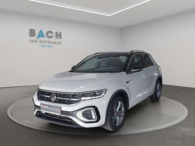 Ascotgrau schwarz Gebraucht 2023 VW T-Roc R-line SUV | 24.900 € (Fairer Preis) - Bild 1/4