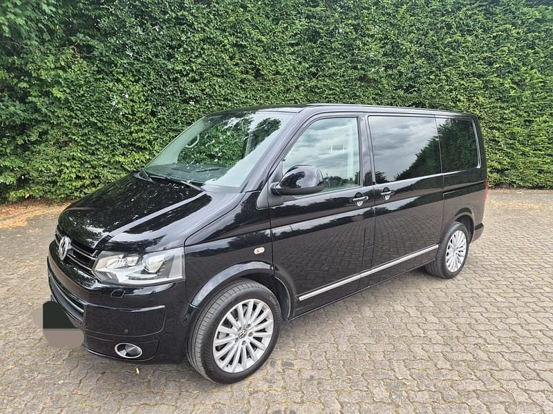 Schwarz Gebraucht 2013 VW Multivan Highline Van | 22.000 € (Fairer Preis) - Bild 1/4