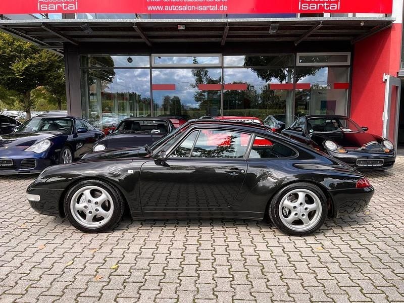 Schwarz (schwarz l744) Gebraucht 1997 Porsche 993 Coupé | 88.888 € - Bild 1/4