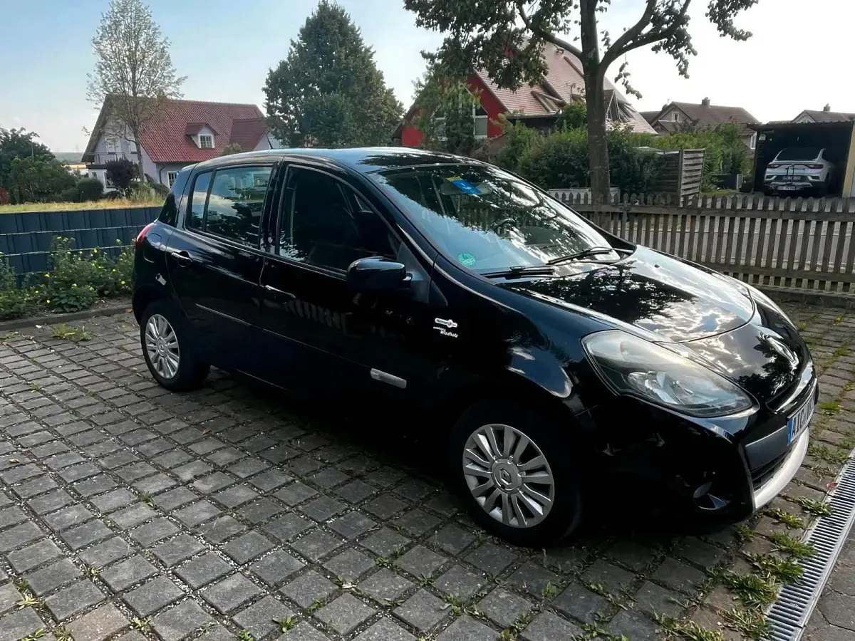 Gebraucht Renault Clio 75 PS (55 kW) 2012 Schwarz Kleinwagen