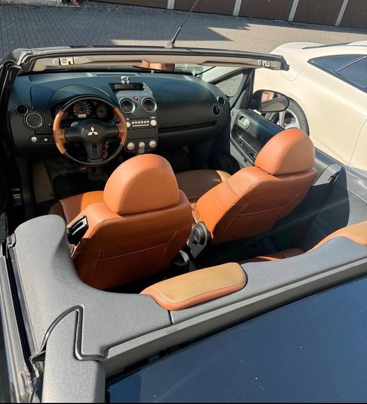 Gebraucht Mitsubishi Colt 109 PS (80 kW) 2006 Schwarz Cabrio