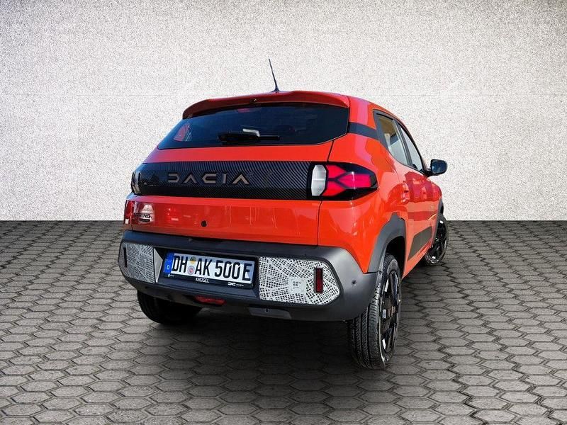 Gebraucht Dacia Spring Extreme 47 kW (65 PS) 2024 Brick red Kleinwagen