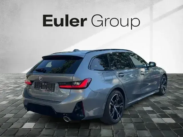 Gebraucht BMW 320e Performance 204 PS (150 kW) 2022 Grau Kombi