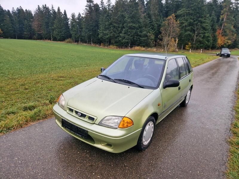 Grün Gebraucht 1998 Subaru Justy Kleinwagen | 2.450 € - Bild 1/4