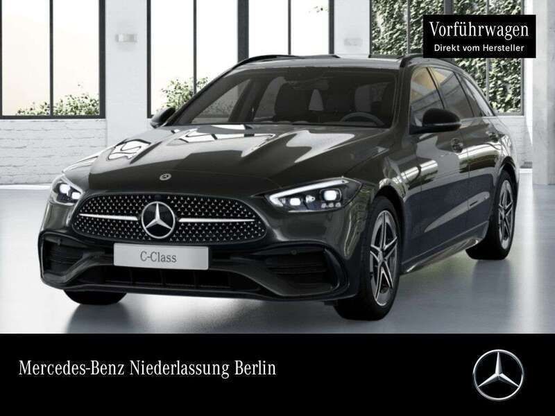 Graphitgrau Gebraucht 2024 Mercedes C300e AMG Kombi | 53.890 € - Bild 1/4