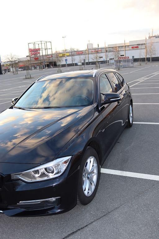 Gebraucht BMW 320 Luxury Line 184 PS (135 kW) 2014 Schwarz Kombi