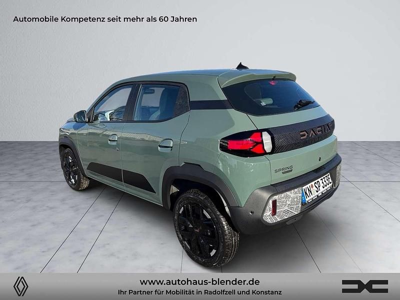 Gebraucht Dacia Spring Extreme 47 kW (65 PS) 2025 Olivgrün Kleinwagen