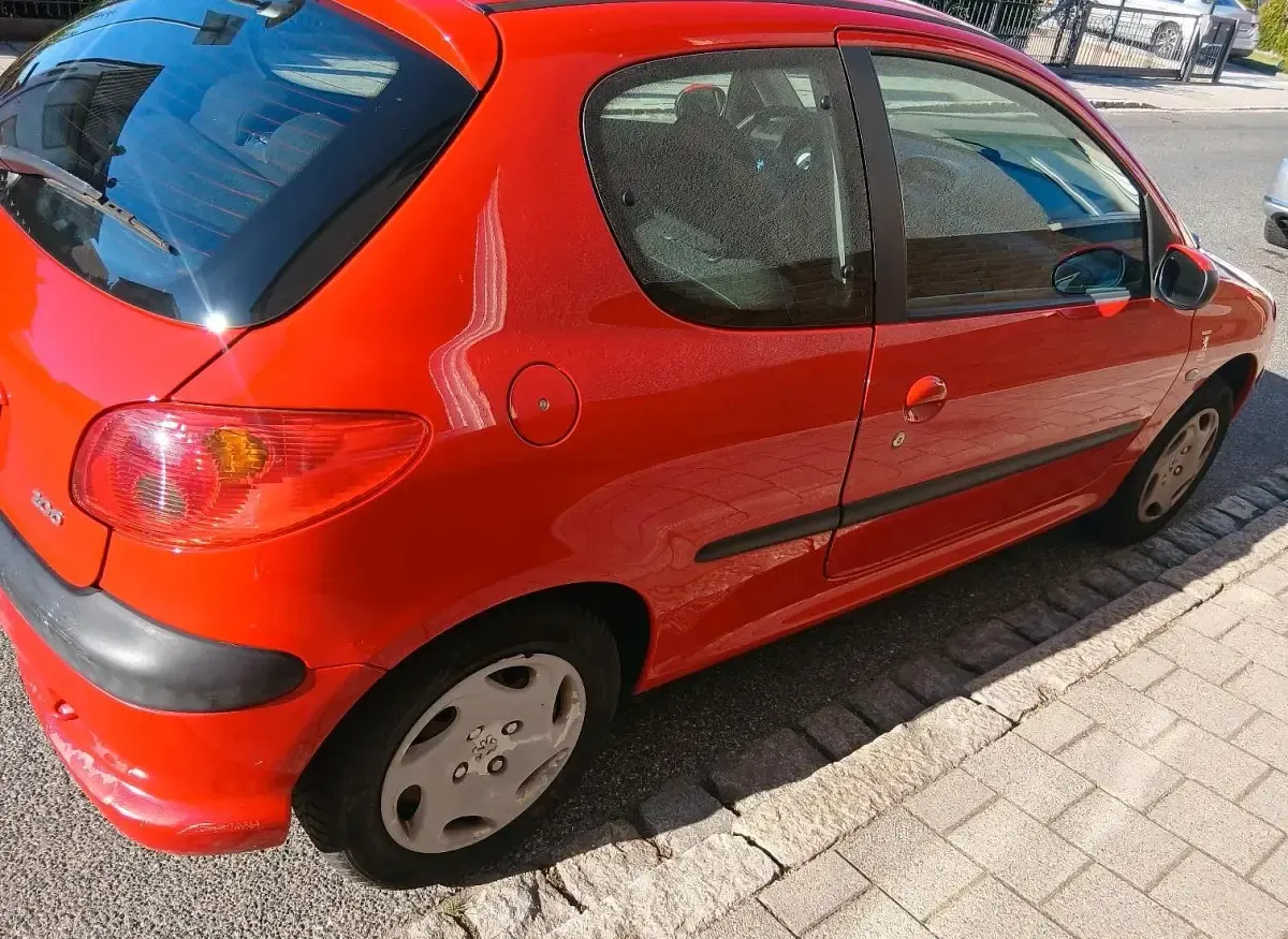 Gebraucht Peugeot 206 60 PS (44 kW) 2004 Rot Kleinwagen