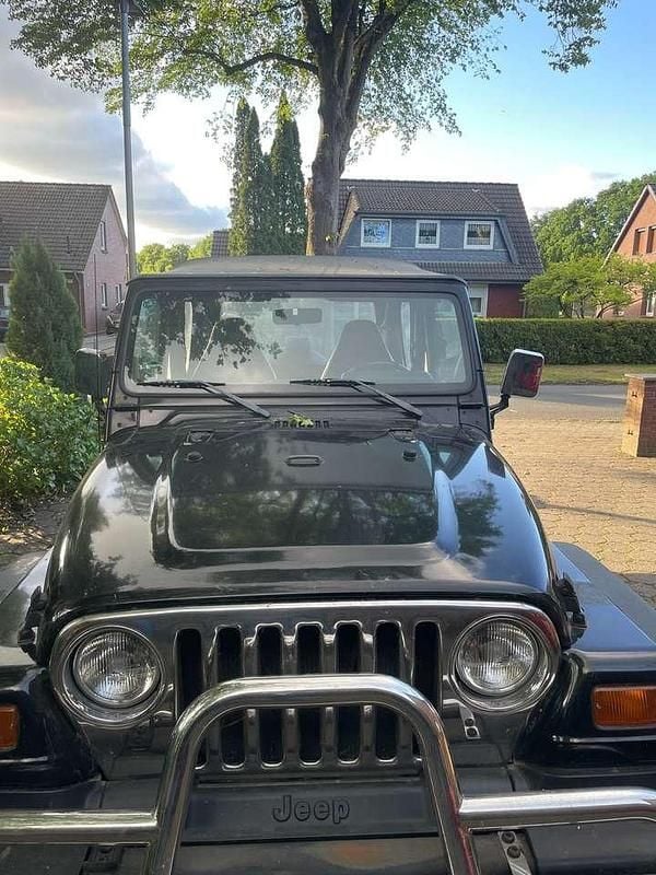 Schwarz Gebraucht 1998 Jeep Wrangler Sport SUV | 12.800 € (Fairer Preis) - Bild 1/4