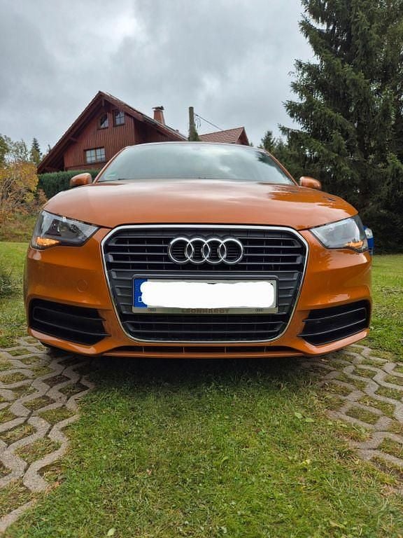 Orange Gebraucht 2012 Audi A1 Kleinwagen | 8.999 € (Guter Preis) - Bild 1/4