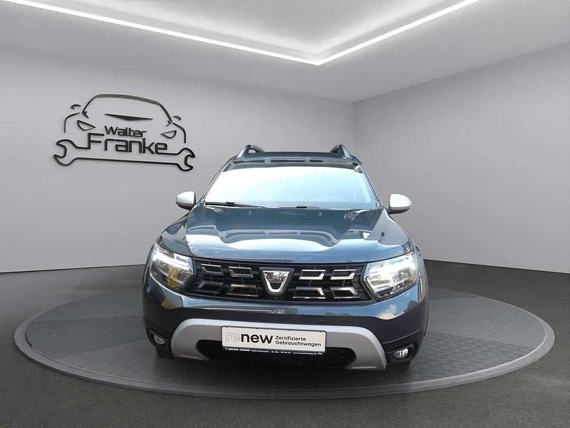 Kometengrau Gebraucht 2022 Dacia Duster Prestige SUV | 17.290 € (Guter Preis) - Bild 1/4