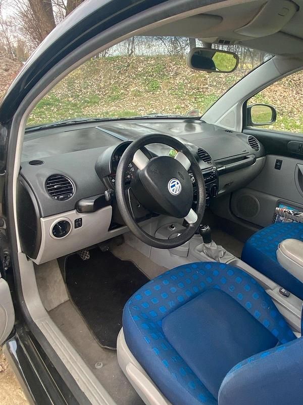 Gebraucht VW New Beetle 107 PS (78 kW) 2002 Schwarz Kleinwagen