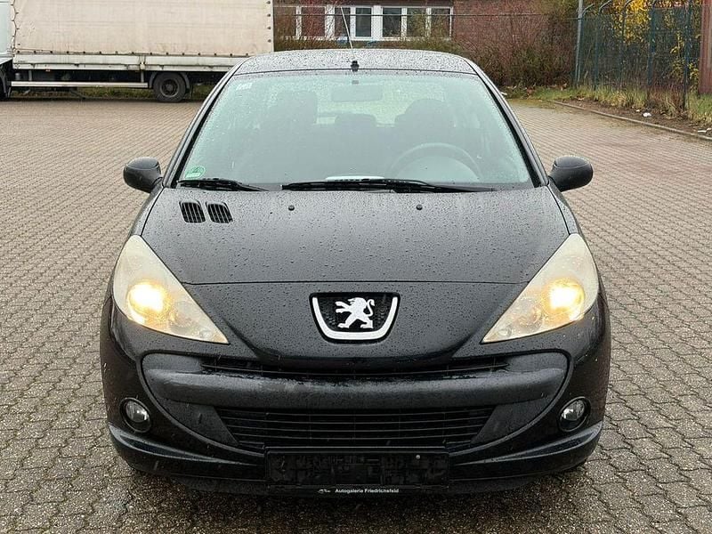 Gebraucht Peugeot 206+ Basis 73 PS (53 kW) 2011 Schwarz Kleinwagen