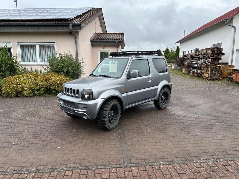 Grau Gebraucht 2010 Suzuki Jimny SUV | 9.500 € (Teuer) - Bild 1/4