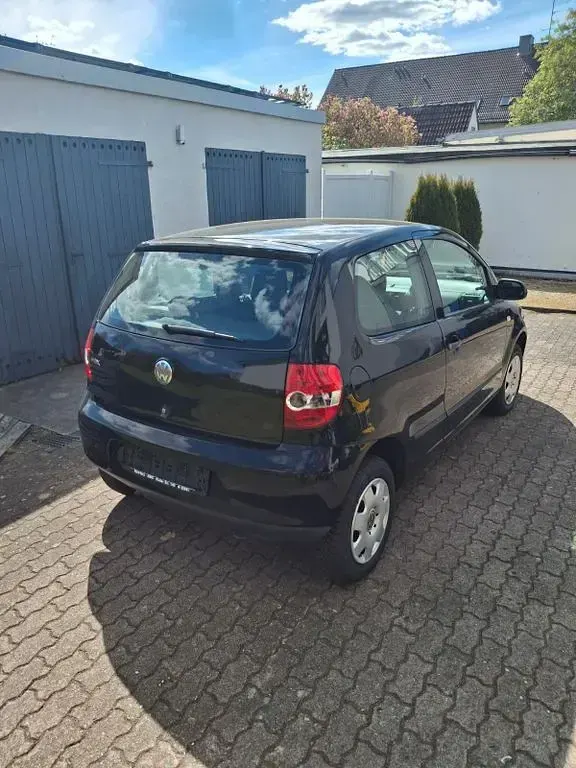 Gebraucht VW Fox 54 PS (39 kW) 2007 Schwarz Kleinwagen