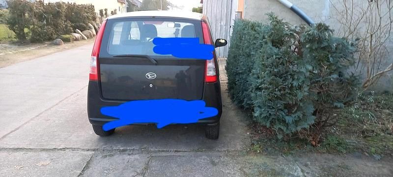 Gebraucht Daihatsu Cuore 58 PS (42 kW) 2005 Schwarz Kleinwagen