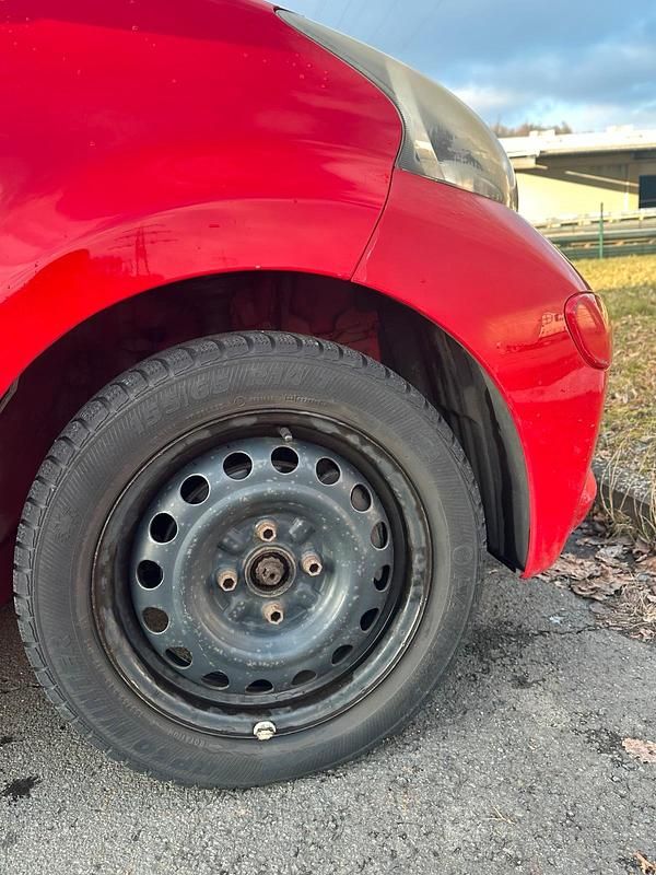 Gebraucht Toyota Aygo 68 PS (50 kW) 2006 Rot Kleinwagen