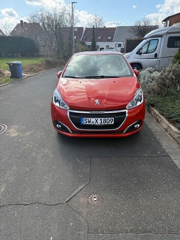 Gebraucht Peugeot 208 82 PS (60 kW) 2016 Orange Kleinwagen