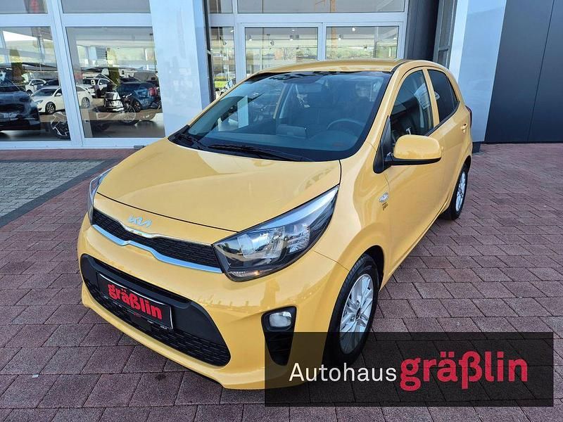 Gelb Gebraucht 2022 Kia Picanto DREAM-TEAM Edition Kleinwagen | 11.700 € (Fairer Preis) - Bild 1/3