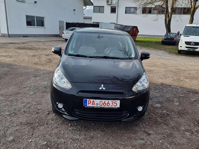 Second-hand Mitsubishi Space Star Top 80 CP (58 kW) 2014 Negru Hatchback