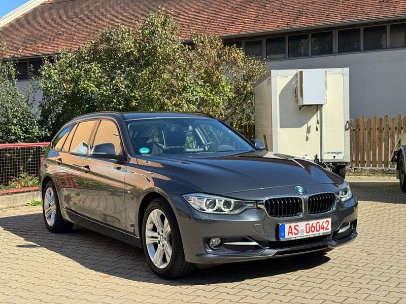 Grau Gebraucht 2015 BMW 318 Sport Line Kombi | 7.950 € (Guter Preis) - Bild 1/4