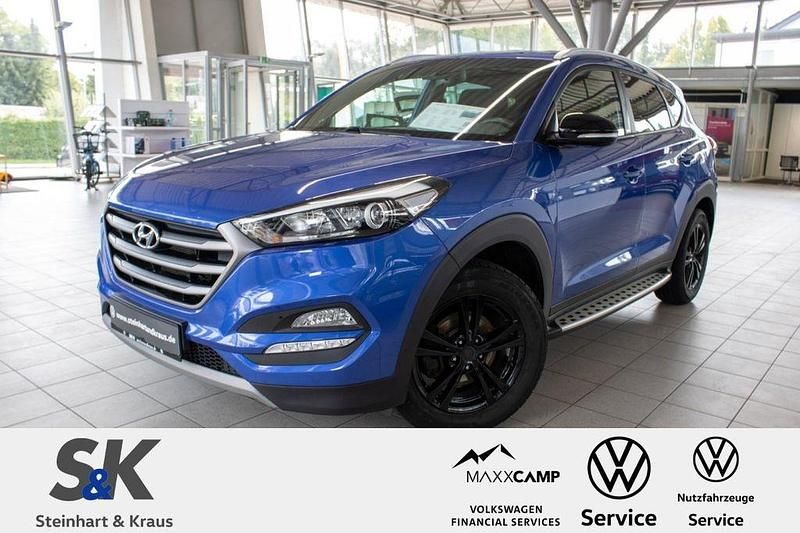 Blau Gebraucht 2018 Hyundai Tucson Passion SUV | 15.990 € (Fairer Preis) - Bild 1/4