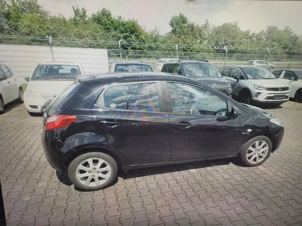 Gebraucht Mazda 2 Independence 75 PS (55 kW) 2009 Schwarz Kleinwagen