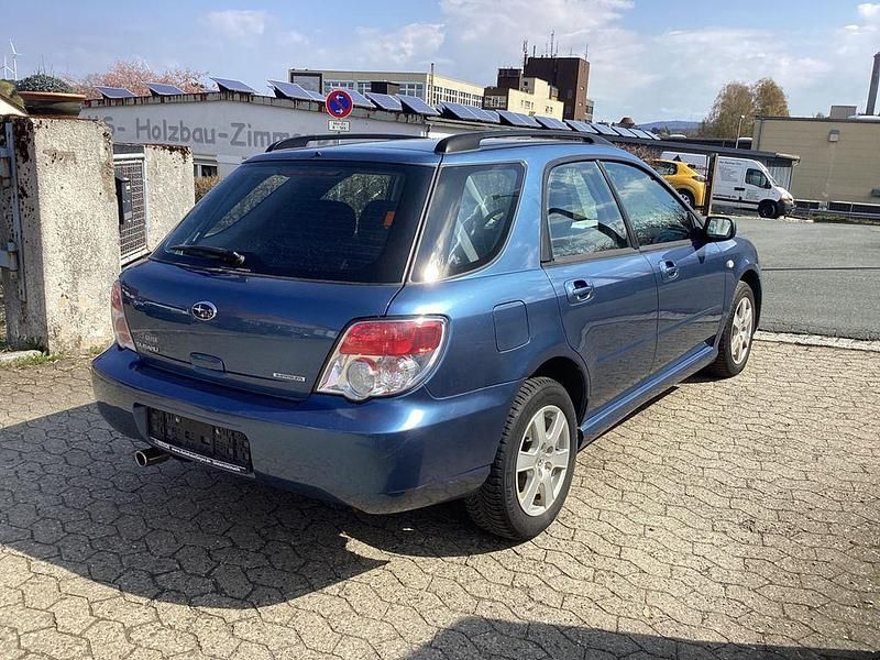 Gebraucht Subaru Impreza 105 PS (77 kW) 2006 Blau Kombi