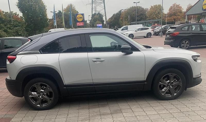 Grau Gebraucht 2021 Mazda MX30 SUV | 12.999 € (Superpreis) - Bild 1/4
