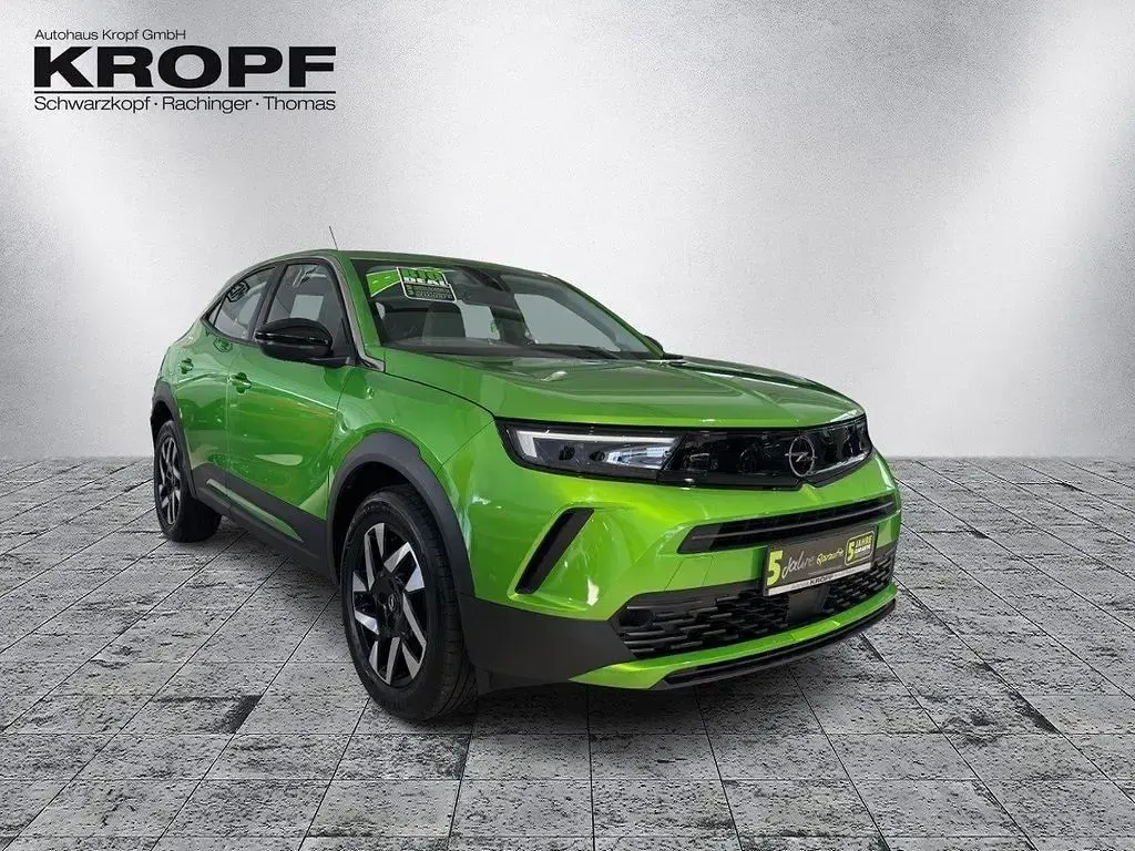 Gebraucht Opel Mokka Elegance 101 PS (74 kW) 2024 Lackierung matcha green/typ au SUV