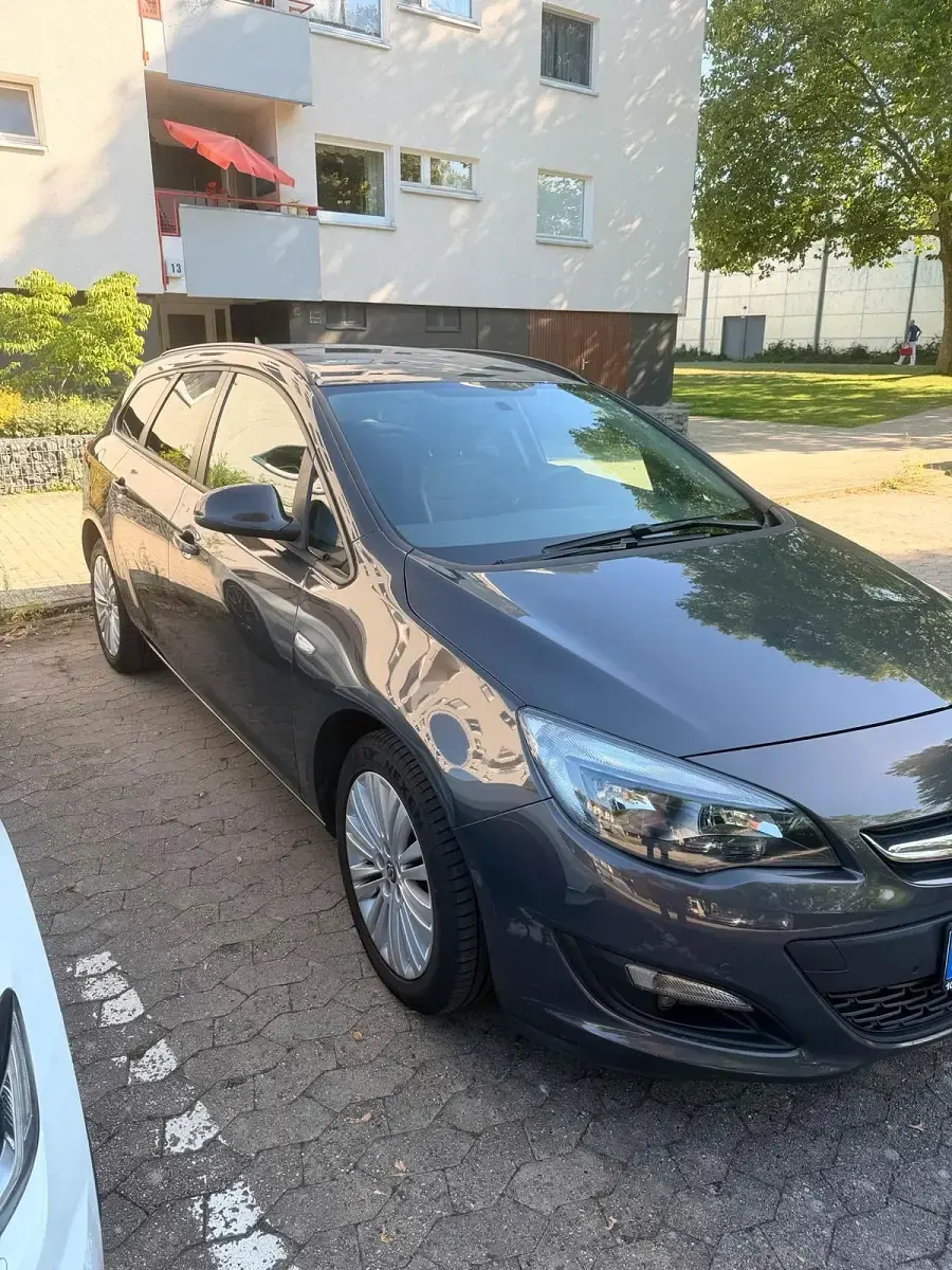 Gebraucht Opel Astra 120 PS (88 kW) 2014 Grau Kombi
