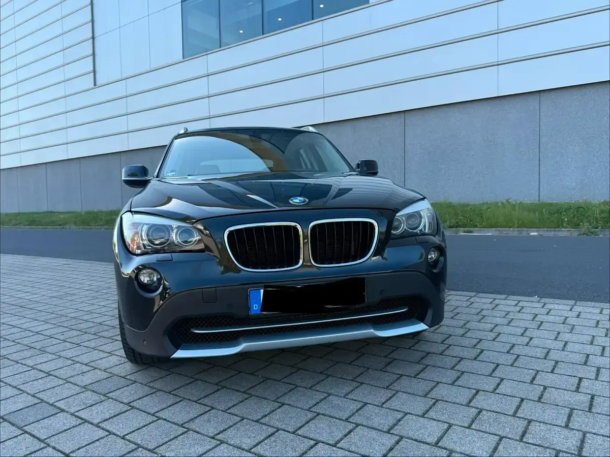 Second-hand BMW X1 184 CP (135 kW) 2012 Negru SUV